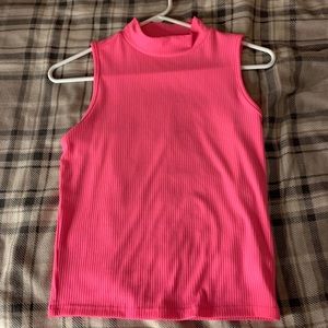 Pink, tank top/crop top. No boundaries.